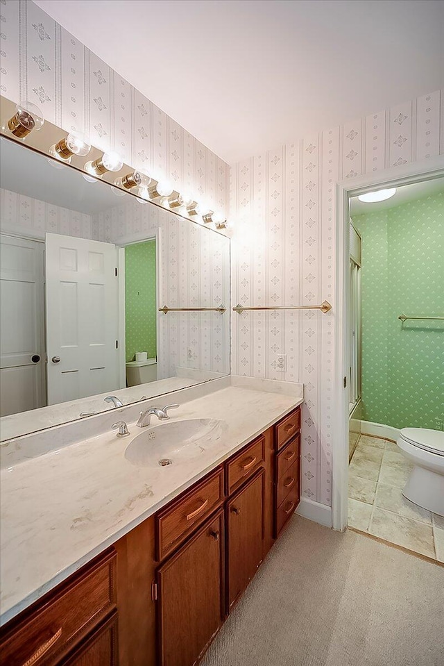 523 Leawood Dr, Frankfort, KY 40601 - full bath with toilet, vanity, a shower with shower door, and wallpapered walls