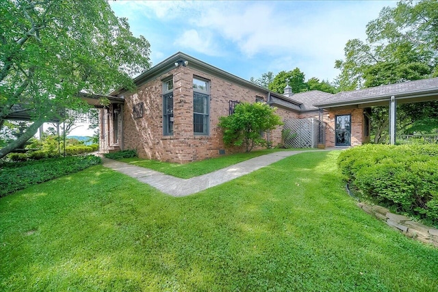 523 Leawood Dr, Frankfort, KY 40601 - view of property exterior featuring brick siding and a yard