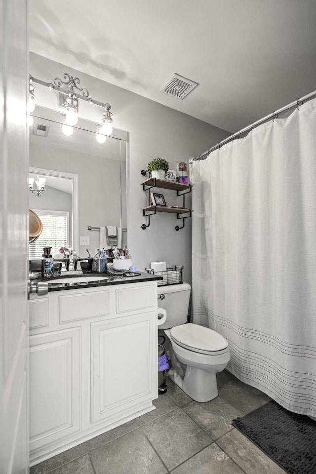 1017 Sugarbush Trl, Lexington, KY 40509 - bathroom with toilet, vanity, and a chandelier