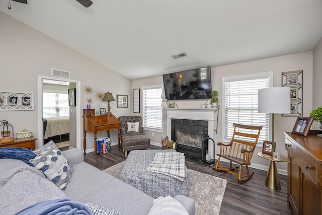 1017 Sugarbush Trl, Lexington, KY 40509 - living room featuring dark wood finished floors, a fireplace with flush hearth, baseboards, vaulted ceiling, and a ceiling fan