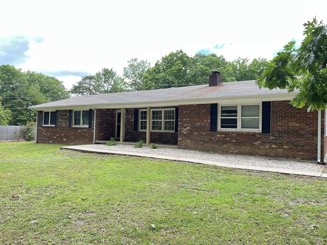 77 Travis Burchfield Rd, Strunk, KY 42649 - single story home with brick siding and a chimney