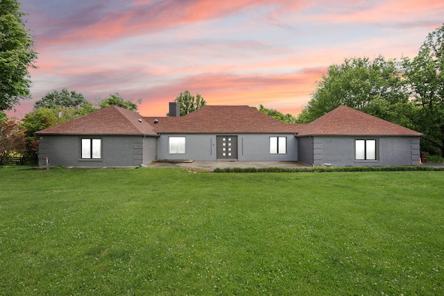 104 Barkley Ests, Nicholasville, KY 40356 - rear view of property featuring a patio area, a chimney, brick siding, and a yard