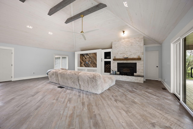 104 Barkley Ests, Nicholasville, KY 40356 - living area with baseboards, wood finished floors, high vaulted ceiling, beamed ceiling, and a stone fireplace