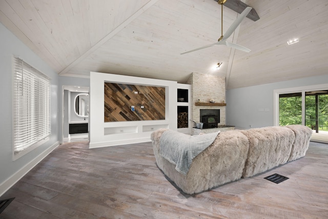 104 Barkley Ests, Nicholasville, KY 40356 - living room featuring baseboards, wood finished floors, a stone fireplace, a ceiling fan, and high vaulted ceiling