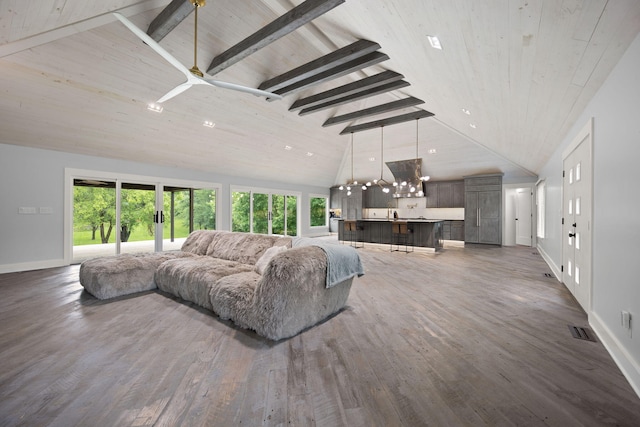 104 Barkley Ests, Nicholasville, KY 40356 - living area featuring baseboards, plenty of natural light, high vaulted ceiling, dark wood-style floors, and wood ceiling with exposed beams