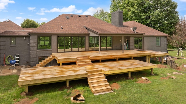 104 Barkley Ests, Nicholasville, KY 40356 - back of property featuring stairway, a chimney, a deck, a lawn, and brick siding
