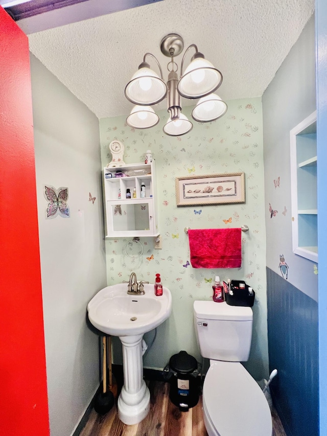 1465 Ky-1629, Corbin, KY 40701 - bathroom with wood finished floors, a textured ceiling, toilet, and baseboards