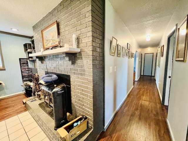 1465 Ky-1629, Corbin, KY 40701 - hall with a textured ceiling, wood finished floors, and baseboards
