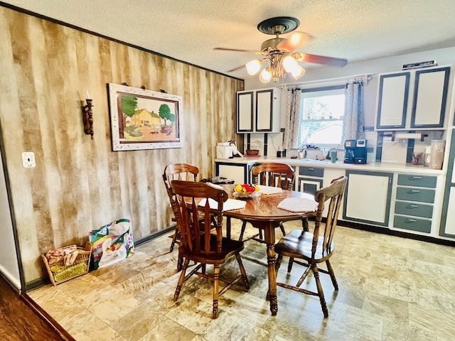 1465 Ky-1629, Corbin, KY 40701 - dining room with wooden walls, a textured ceiling, and ceiling fan