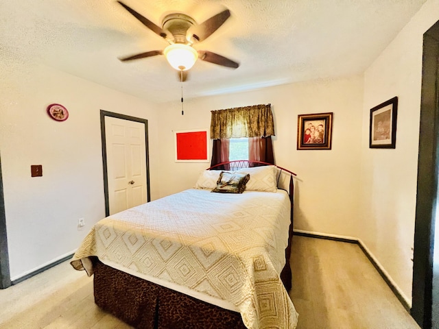 1465 Ky-1629, Corbin, KY 40701 - bedroom with baseboards, a ceiling fan, light wood-style flooring, and a textured ceiling