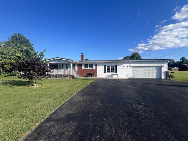 1465 Ky-1629, Corbin, KY 40701 - ranch-style house featuring a garage, driveway, a chimney, a front yard, and covered porch