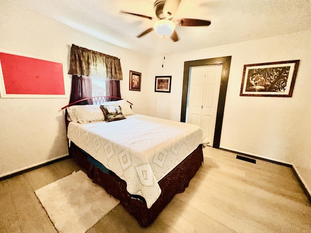 1465 Ky-1629, Corbin, KY 40701 - bedroom featuring wood finished floors, baseboards, a closet, and ceiling fan