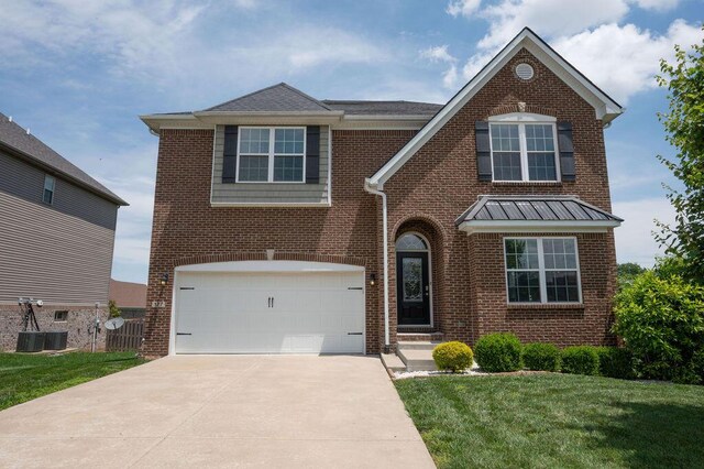 177 Swilcan Bridge Way, Georgetown, KY 40324 - view of front facade featuring brick siding, a garage, and a front yard