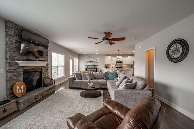 177 Swilcan Bridge Way, Georgetown, KY 40324 - living area featuring wood finished floors, a ceiling fan, a fireplace, baseboards, and recessed lighting