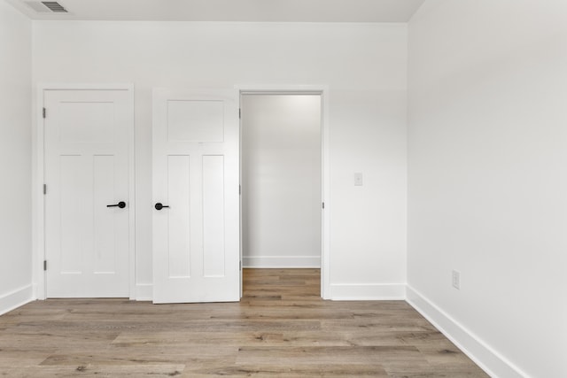 138 Hickory Grove Ln, Stanton, KY 40380 - unfurnished bedroom with light wood-style floors and a closet