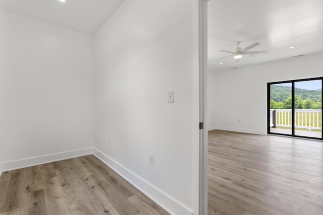 138 Hickory Grove Ln, Stanton, KY 40380 - spare room featuring light wood-type flooring, ceiling fan, and recessed lighting