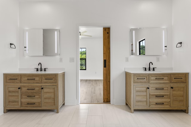 138 Hickory Grove Ln, Stanton, KY 40380 - full bath featuring two vanities and a ceiling fan