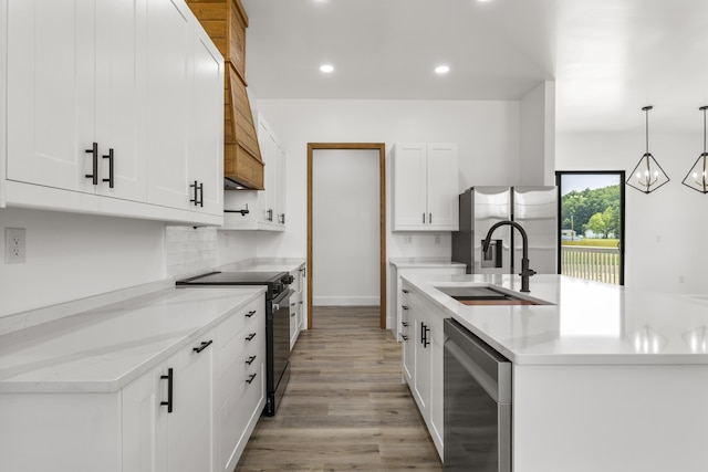138 Hickory Grove Ln, Stanton, KY 40380 - kitchen featuring appliances with stainless steel finishes, recessed lighting, decorative backsplash, light wood finished floors, and white cabinetry