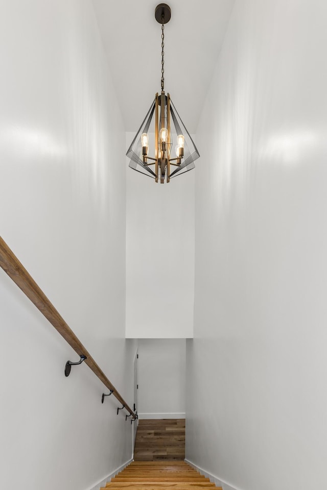 138 Hickory Grove Ln, Stanton, KY 40380 - stairs featuring a chandelier and wood finished floors