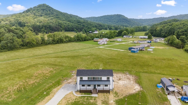 138 Hickory Grove Ln, Stanton, KY 40380 - overview of rural landscape featuring a heavily wooded area and a mountain backdrop
