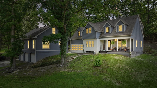 832 N 25th St, Middlesboro, KY 40965 - rear view of house featuring covered porch, a garage, and a yard