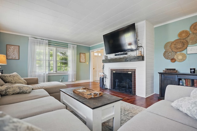 832 N 25th St, Middlesboro, KY 40965 - living area with crown molding, a brick fireplace, and wood finished floors