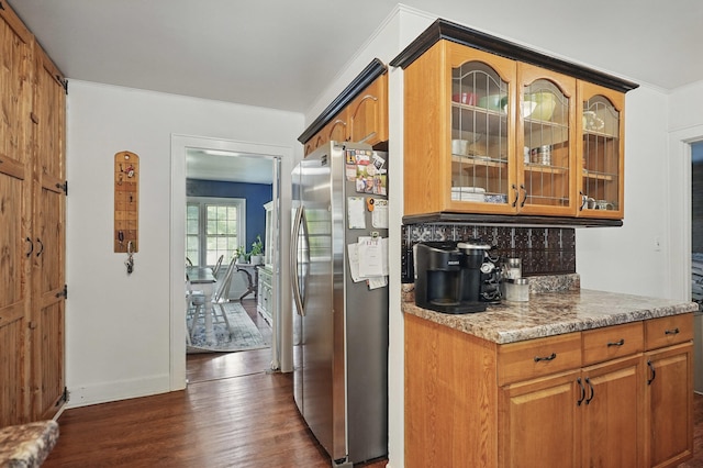 832 N 25th St, Middlesboro, KY 40965 - kitchen with freestanding refrigerator, dark wood finished floors, backsplash, glass insert cabinets, and baseboards