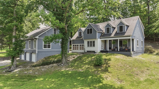 832 N 25th St, Middlesboro, KY 40965 - view of front of property with an attached garage, covered porch, and a front lawn