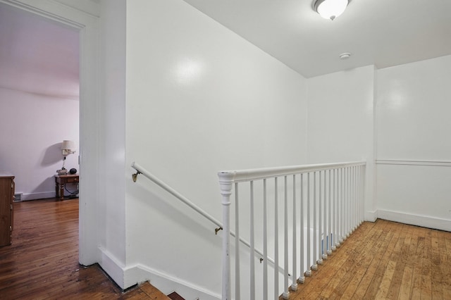 832 N 25th St, Middlesboro, KY 40965 - hallway featuring an upstairs landing, hardwood / wood-style floors, and baseboards