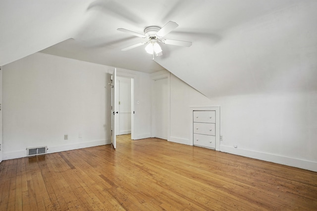 832 N 25th St, Middlesboro, KY 40965 - additional living space with ceiling fan, light wood-style flooring, baseboards, and vaulted ceiling