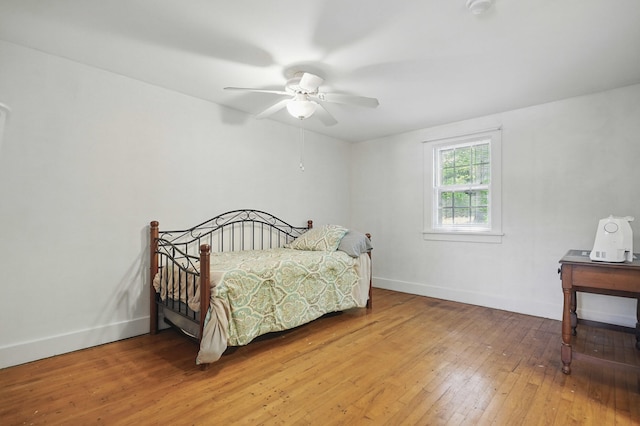832 N 25th St, Middlesboro, KY 40965 - bedroom featuring wood-type flooring, baseboards, and a ceiling fan