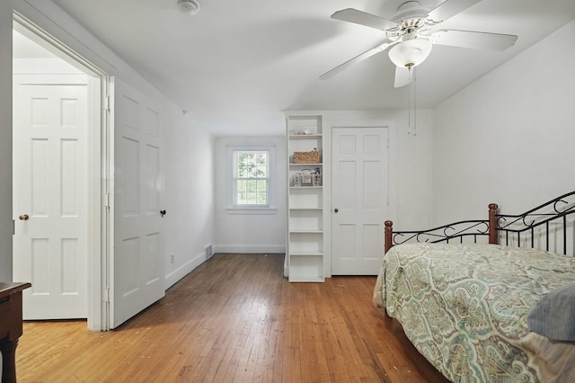 832 N 25th St, Middlesboro, KY 40965 - bedroom featuring wood-type flooring and baseboards