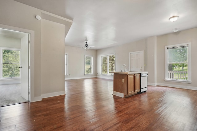 832 N 25th St, Middlesboro, KY 40965 - kitchen featuring open floor plan, brown cabinetry, a kitchen island with sink, light countertops, and ceiling fan