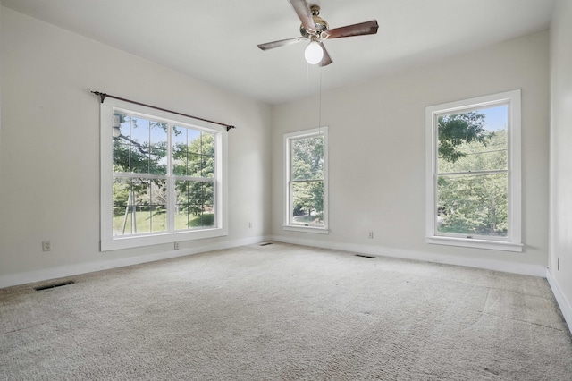 832 N 25th St, Middlesboro, KY 40965 - empty room featuring ceiling fan, carpet flooring, and baseboards