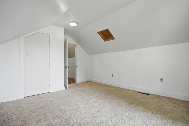 832 N 25th St, Middlesboro, KY 40965 - additional living space with carpet flooring, lofted ceiling, and baseboards