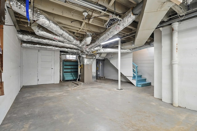 832 N 25th St, Middlesboro, KY 40965 - unfinished basement featuring stairs and electric water heater