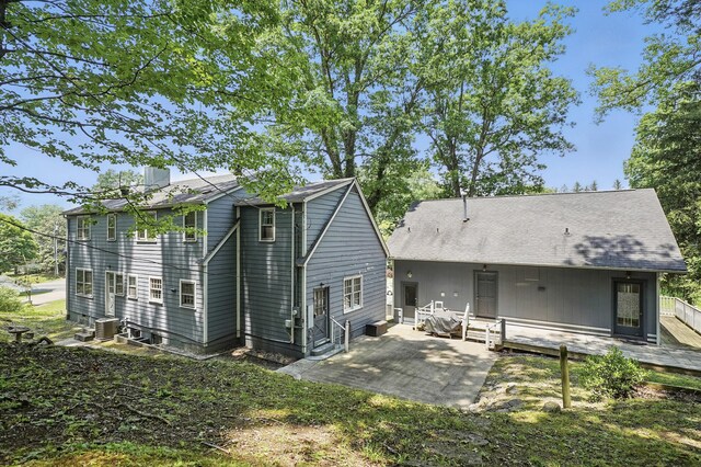 832 N 25th St, Middlesboro, KY 40965 - rear view of property featuring central AC unit, a patio, a chimney, and a deck