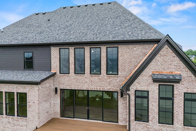 3852 Silver Charm Ln, Lexington, KY 40509 - rear view of house with roof with shingles and brick siding