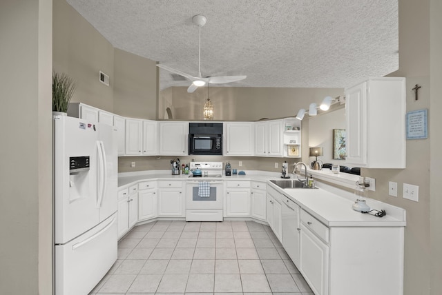 1217 Wyndham Hills Dr, Lexington, KY 40514 - kitchen featuring white appliances, a sink, a textured ceiling, light tile patterned floors, and high vaulted ceiling