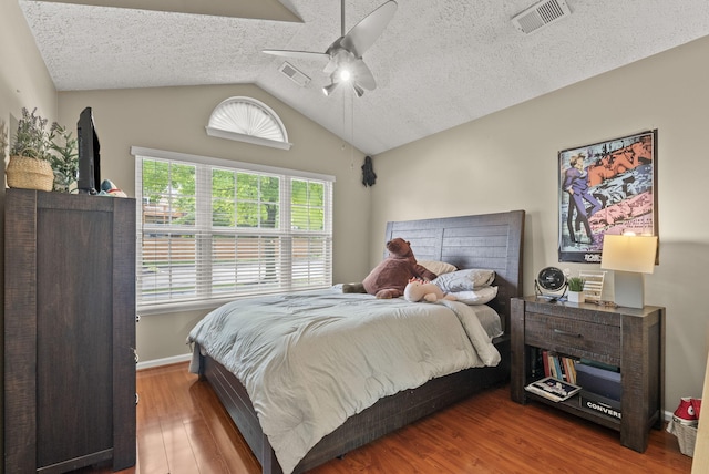 1217 Wyndham Hills Dr, Lexington, KY 40514 - bedroom featuring wood finished floors, lofted ceiling, a textured ceiling, a ceiling fan, and baseboards
