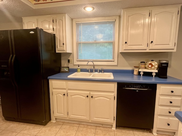 2953 Somerset Rd, London, KY 40741 - kitchen featuring black appliances, a sink, light tile patterned floors, white cabinets, and a textured ceiling