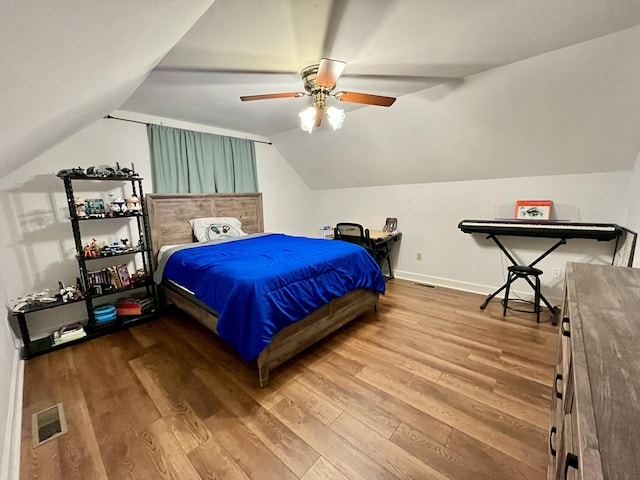 2953 Somerset Rd, London, KY 40741 - bedroom featuring wood finished floors, lofted ceiling, baseboards, and ceiling fan