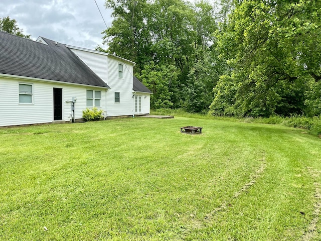 2953 Somerset Rd, London, KY 40741 - view of green lawn featuring a fire pit