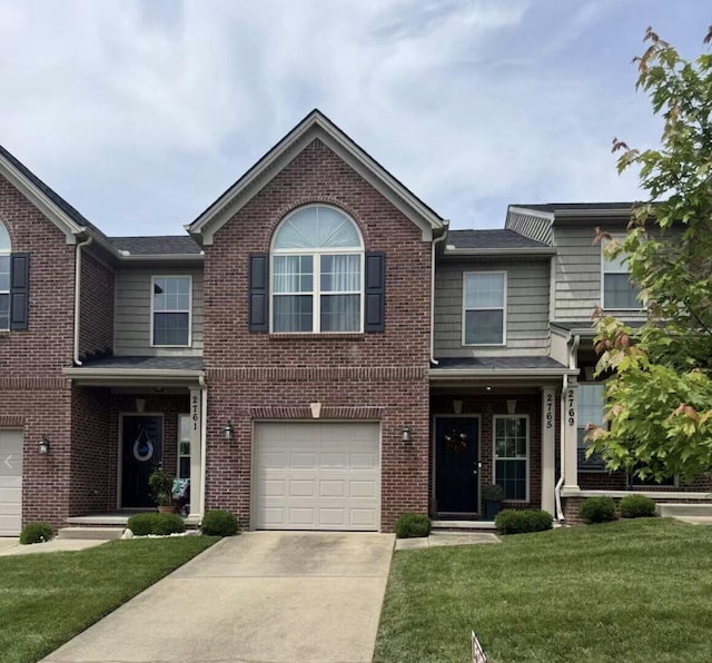 2765 Meadowsweet Ln, Lexington, KY 40511 - view of front of property featuring a front lawn, driveway, and brick siding