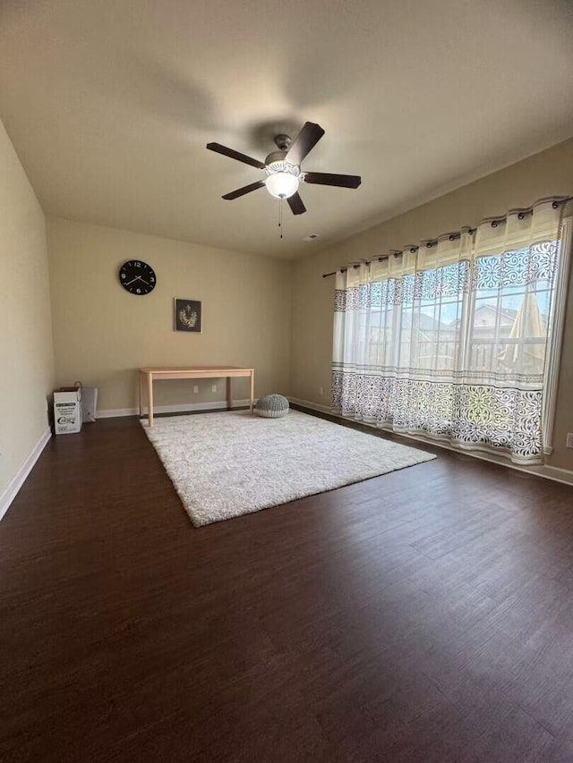 2765 Meadowsweet Ln, Lexington, KY 40511 - living area featuring a ceiling fan, dark wood finished floors, and baseboards