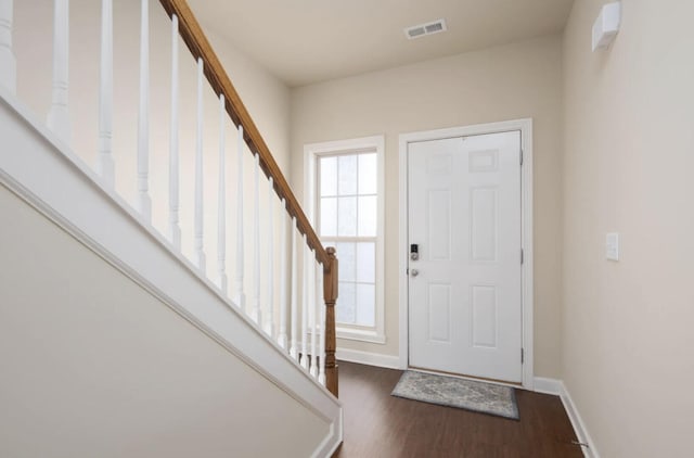 2765 Meadowsweet Ln, Lexington, KY 40511 - entryway featuring wood finished floors, baseboards, and stairs