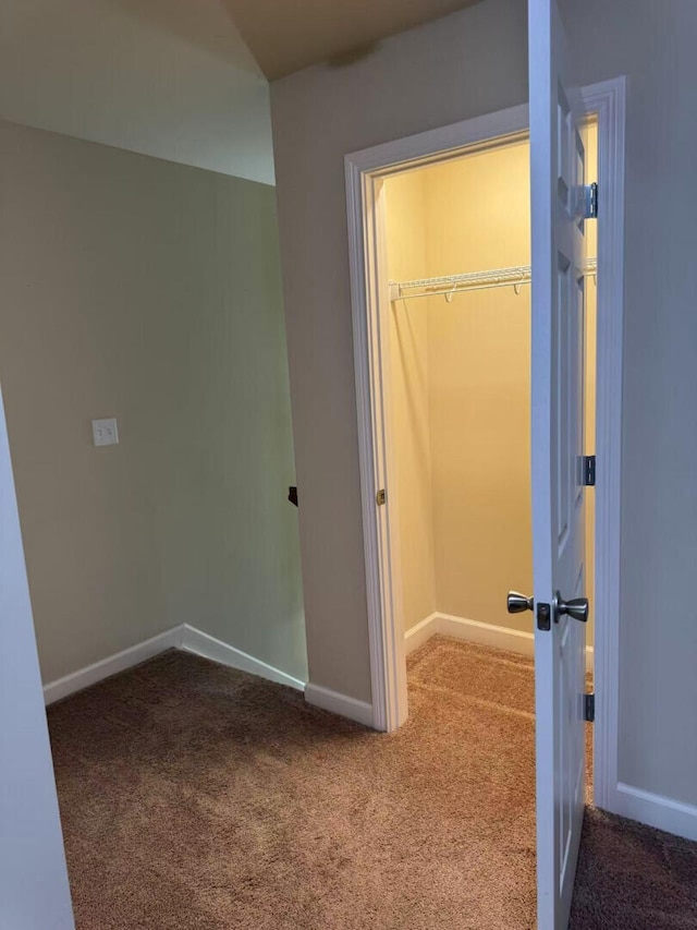 2765 Meadowsweet Ln, Lexington, KY 40511 - interior space featuring carpet flooring, a walk in closet, and baseboards