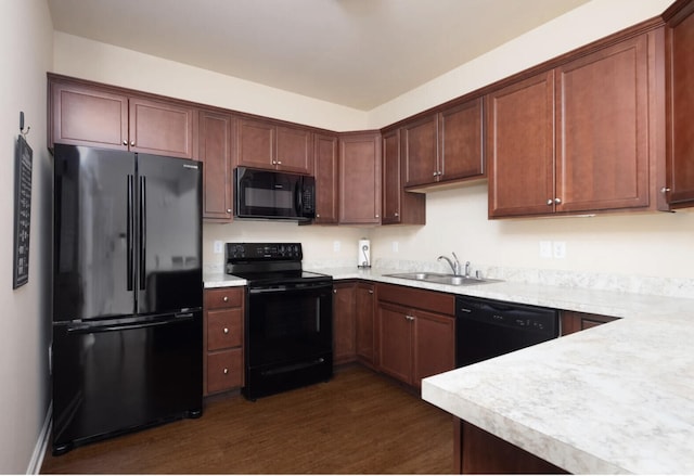 2765 Meadowsweet Ln, Lexington, KY 40511 - kitchen featuring black appliances, a sink, dark wood-type flooring, and light countertops
