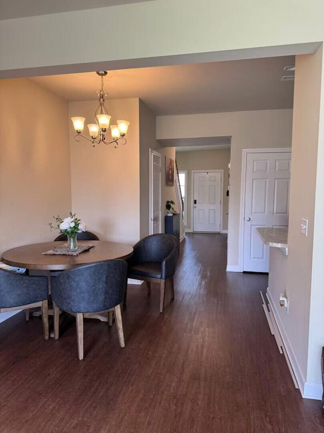 2765 Meadowsweet Ln, Lexington, KY 40511 - dining room with dark wood-style floors, a chandelier, and baseboards