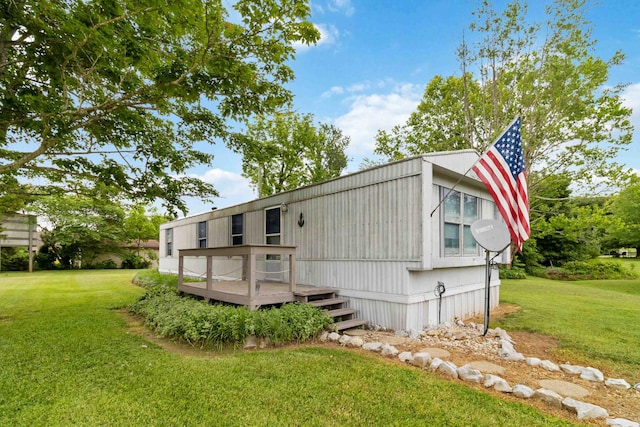 14 Scarlets Way, Bronston, KY 42518 - view of front of house featuring a deck and a front lawn